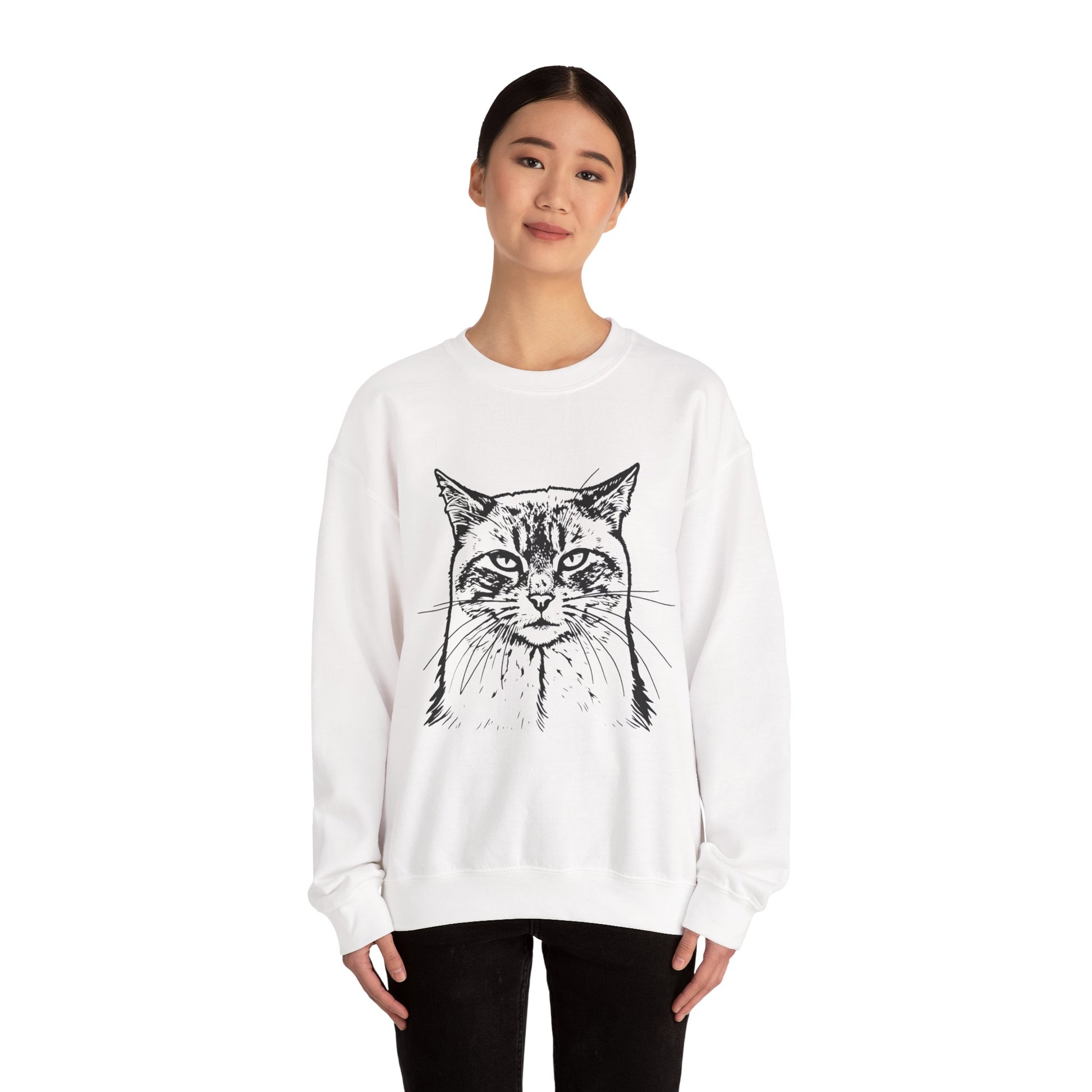 Person wearing a white sweatshirt with a cat design on a white background