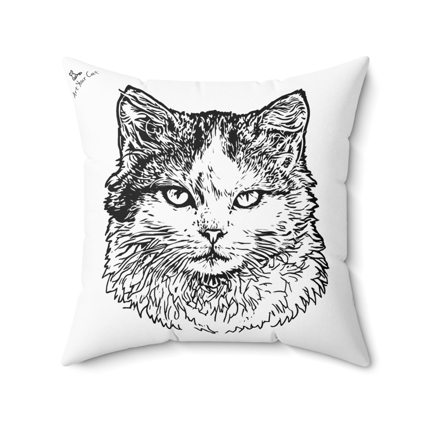 White pillow with a black line drawing of a cat's face on a white background