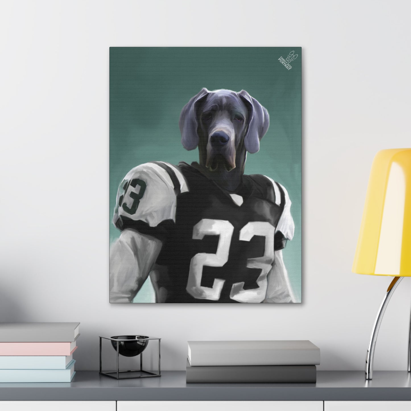 Canvas print of a dog in a sports jersey on a wall above a desk.