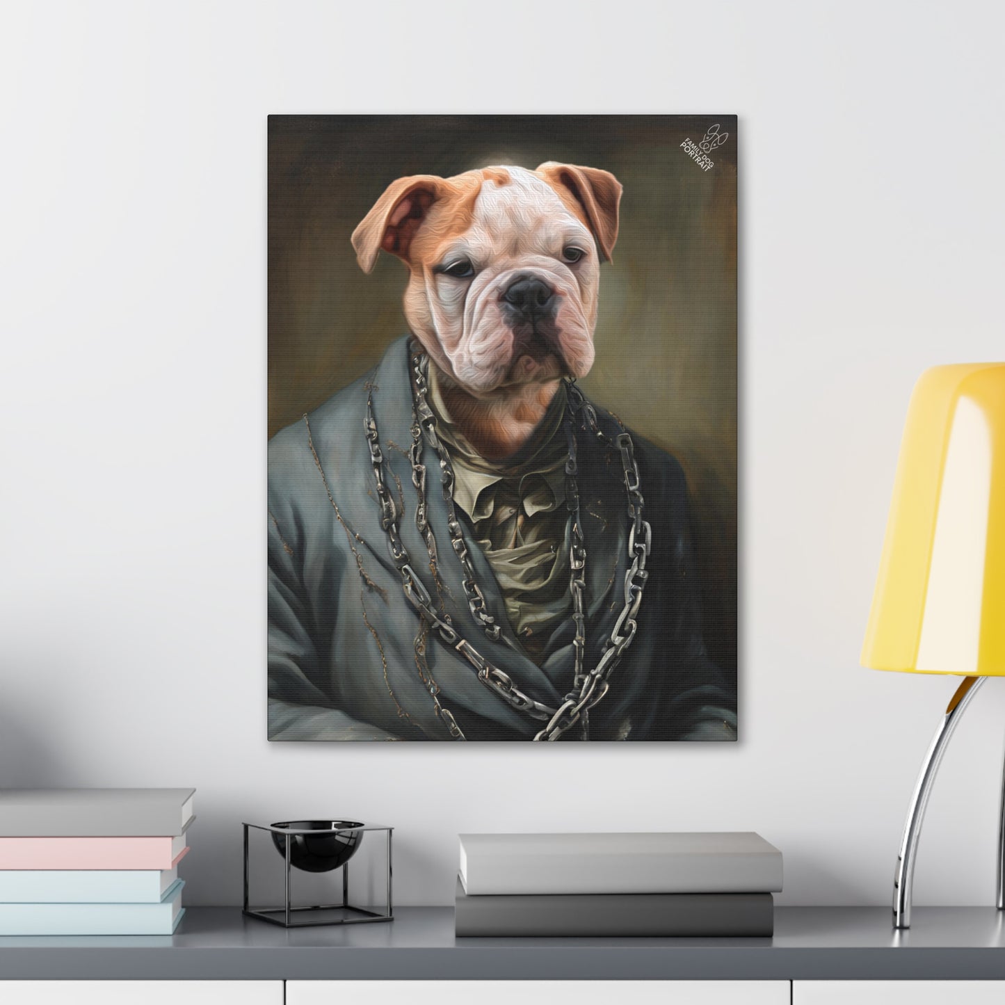 Framed portrait of a dog wearing a coat and chains on a wall above a desk.