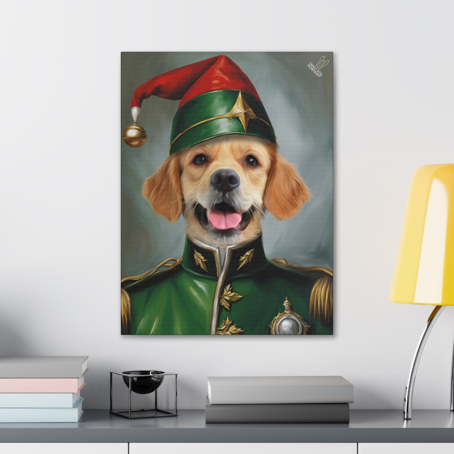 Framed portrait of a dog in a festive costume on a wall above a desk.