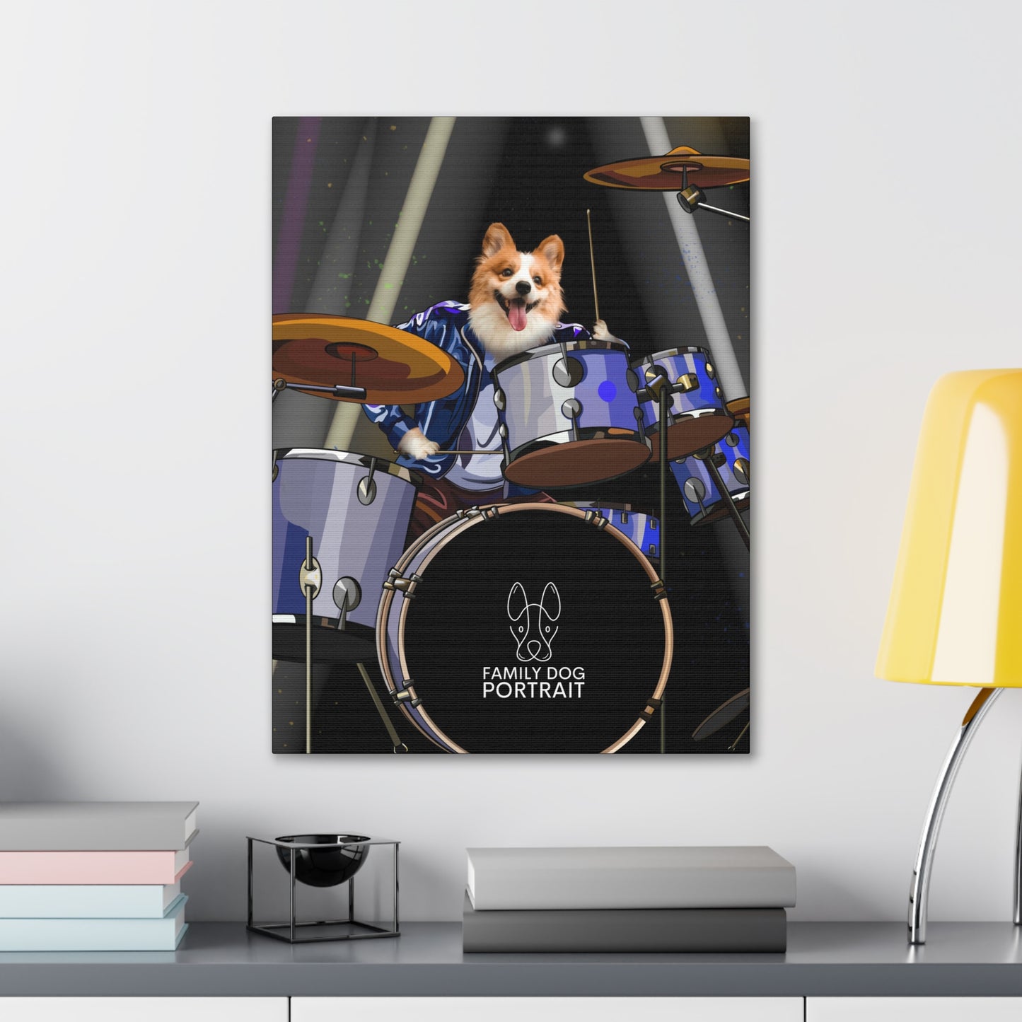 Canvas print of a dog playing drums on a wall above a desk.