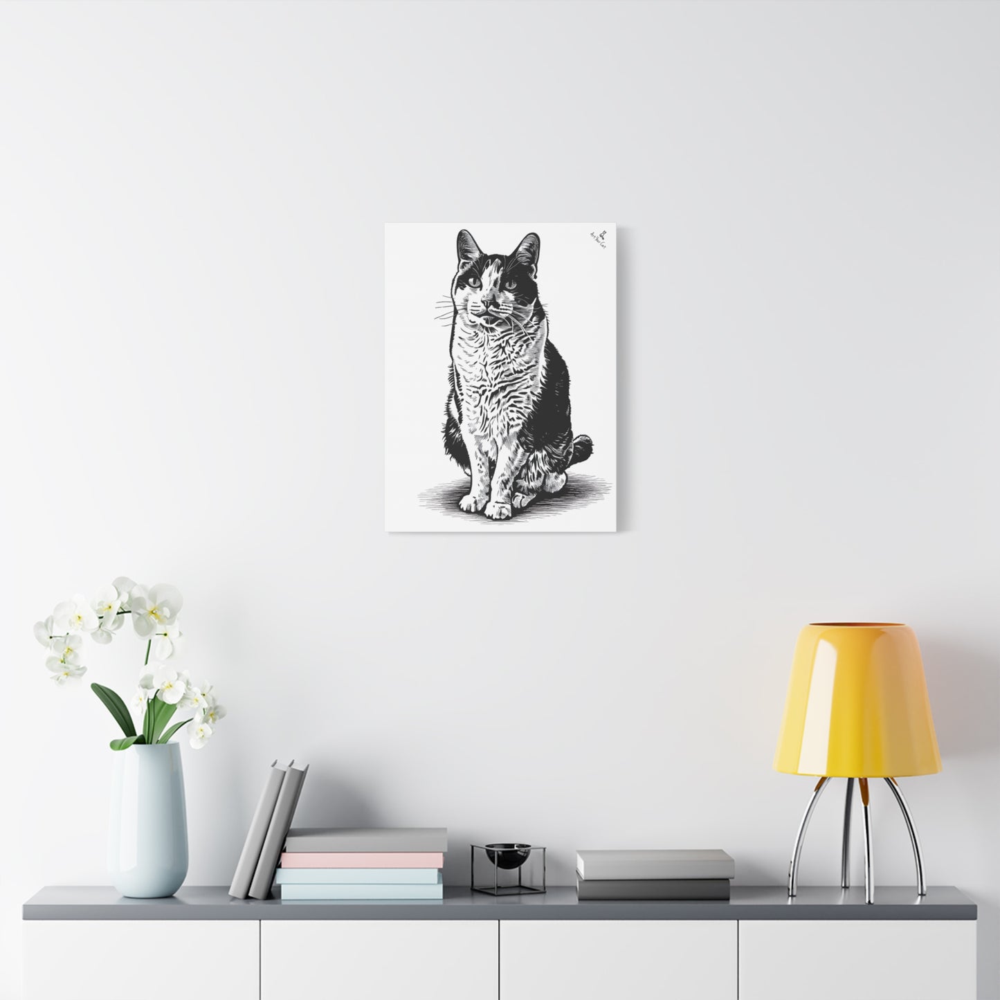 Poster of a cat on a wall above a shelf with decor items
