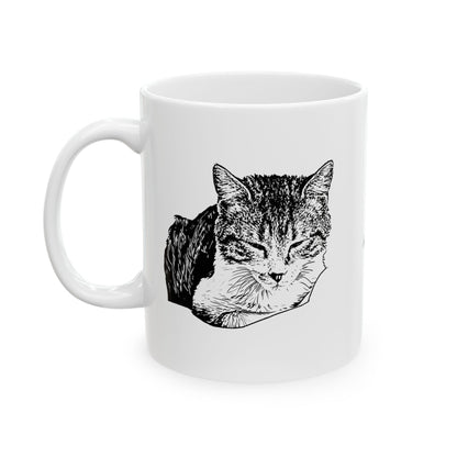 White mug with a black and white cat illustration on a white background