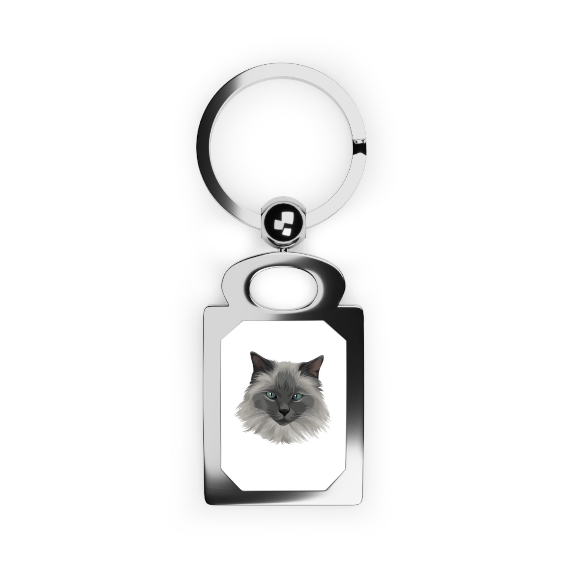 Keychain with a cat's face design on a white background