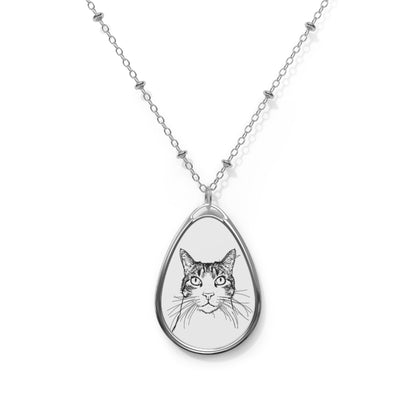 Teardrop-shaped pendant with a cat illustration on a white background