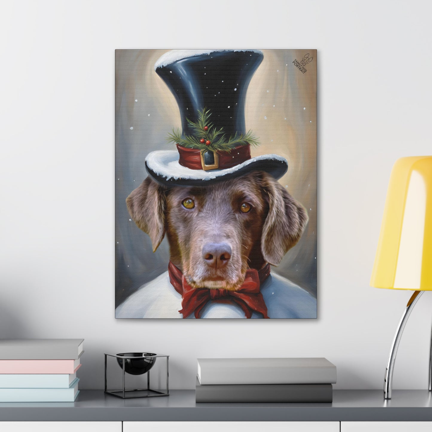 Canvas print of a dog wearing a top hat and bow tie on a wall above a desk.