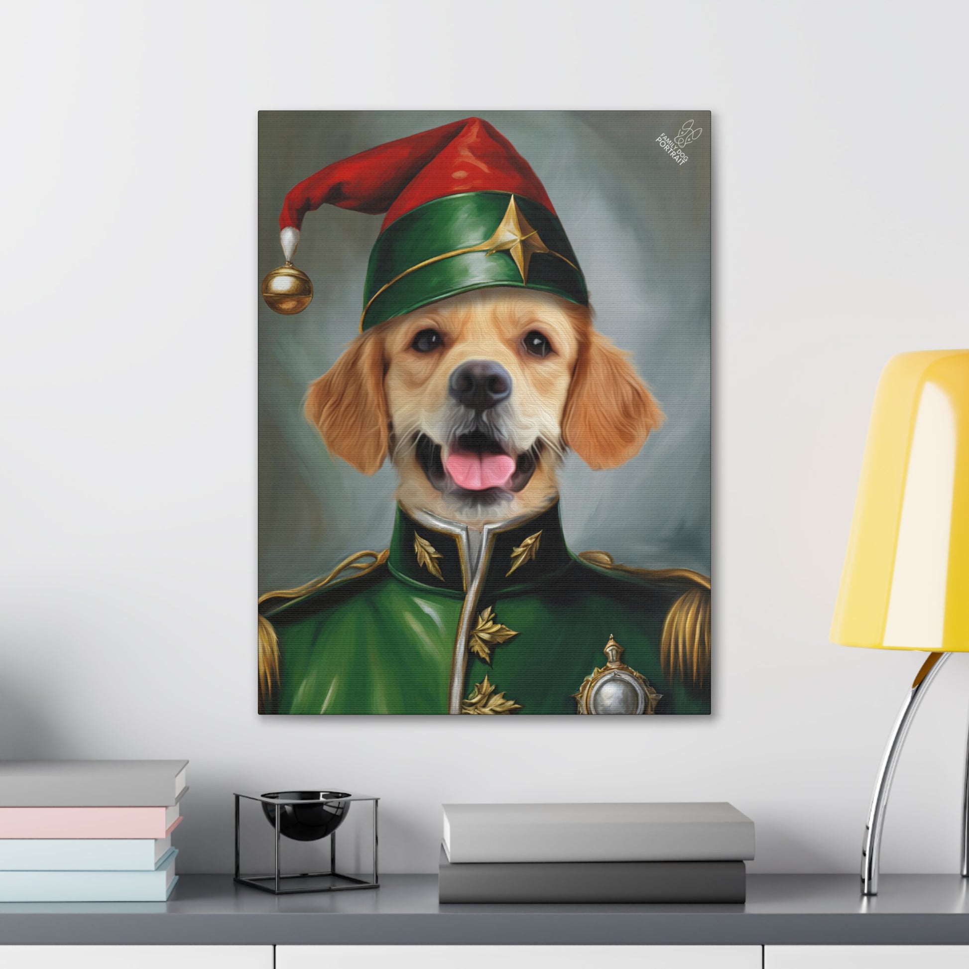 Framed portrait of a dog in a festive costume on a wall above a desk.