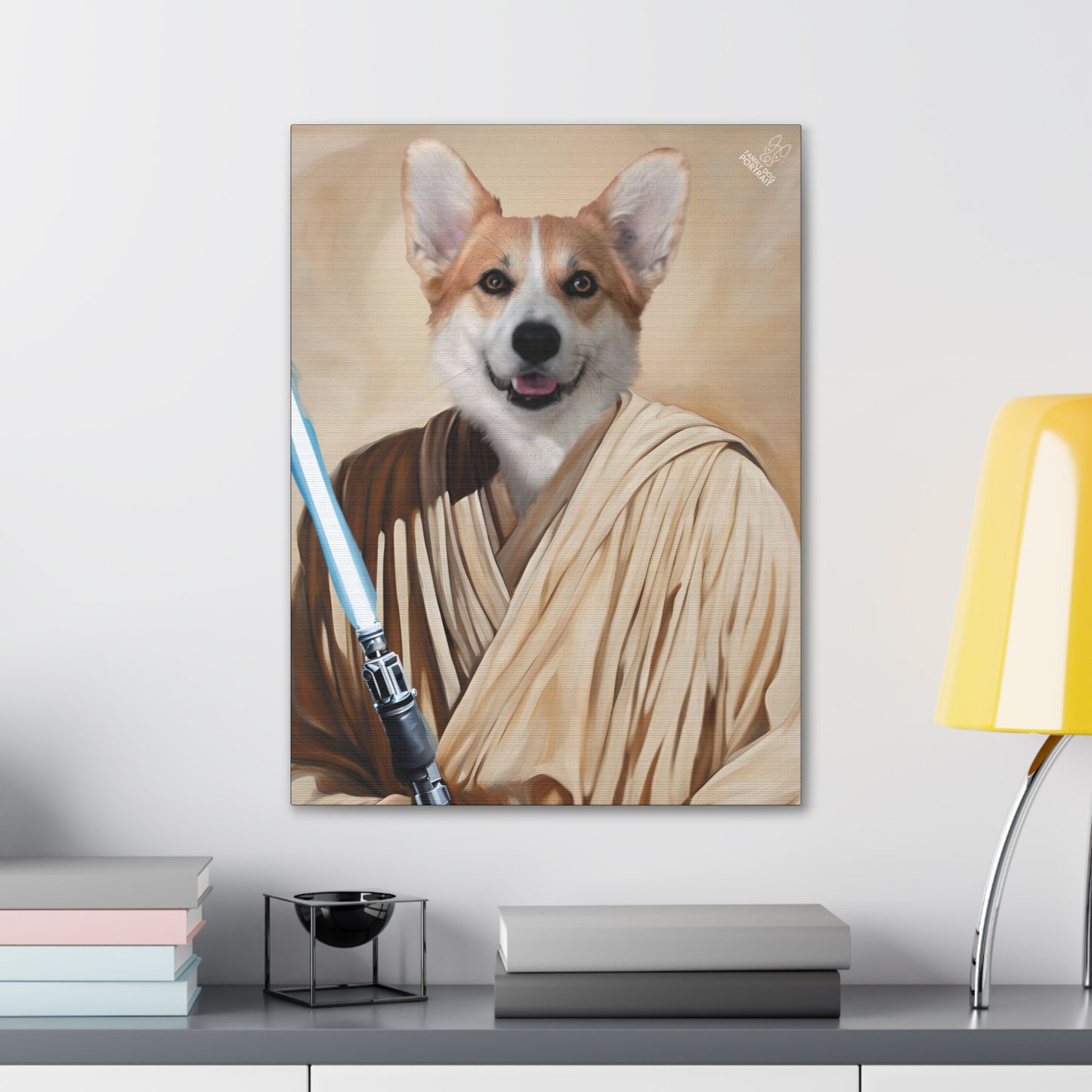 Canvas print of a dog dressed as a Jedi with a lightsaber on a wall above a desk.