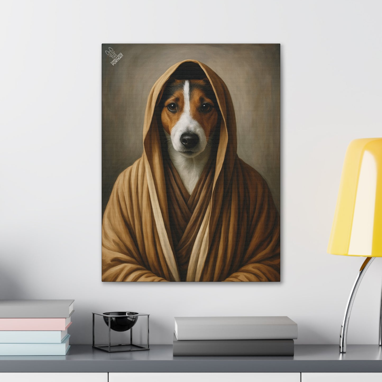 Dog portrait in a robe on a wall above a desk with books and a lamp.