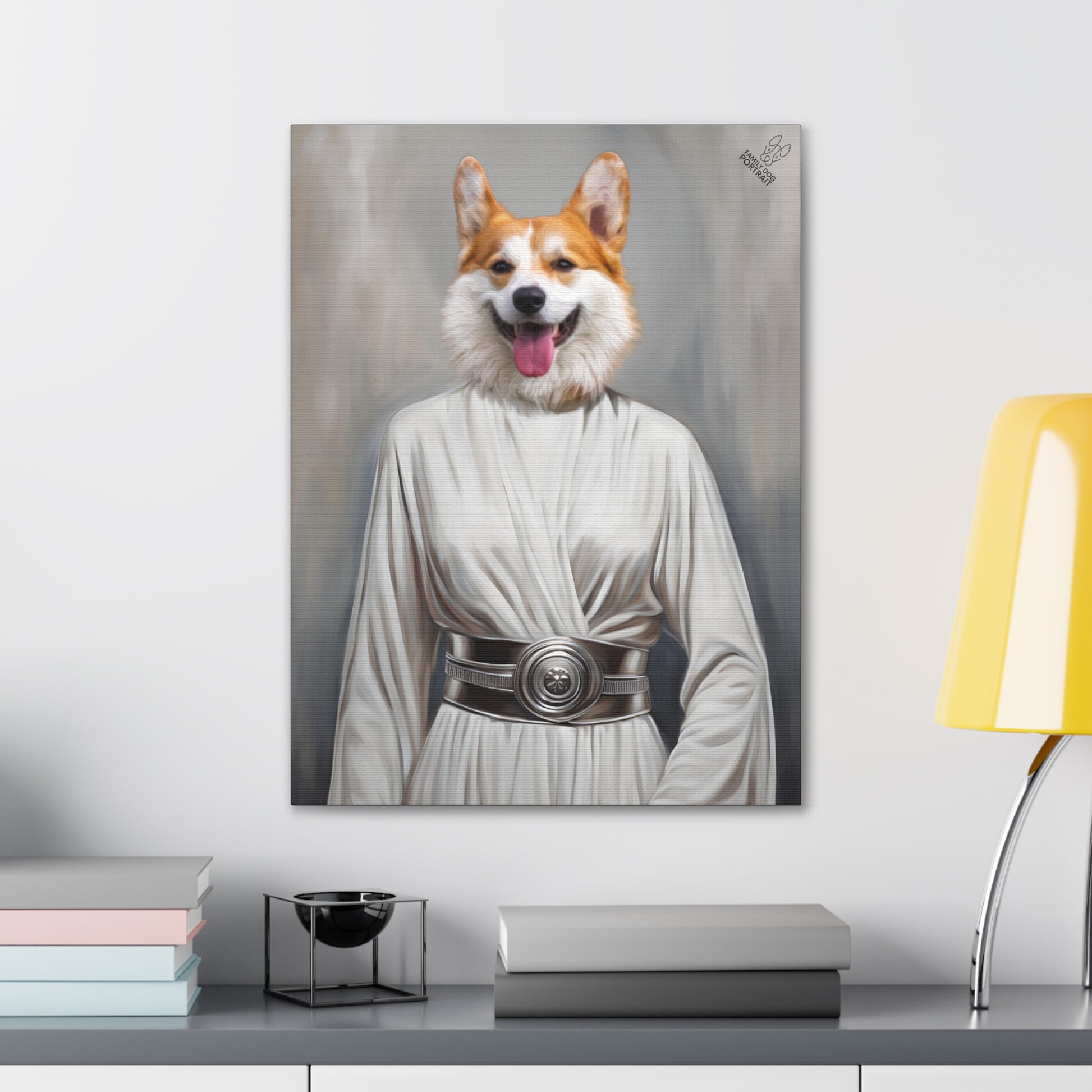 Canvas print of a dog dressed in a white robe with a belt, resembling a character from Star Wars, on a wall above a desk.