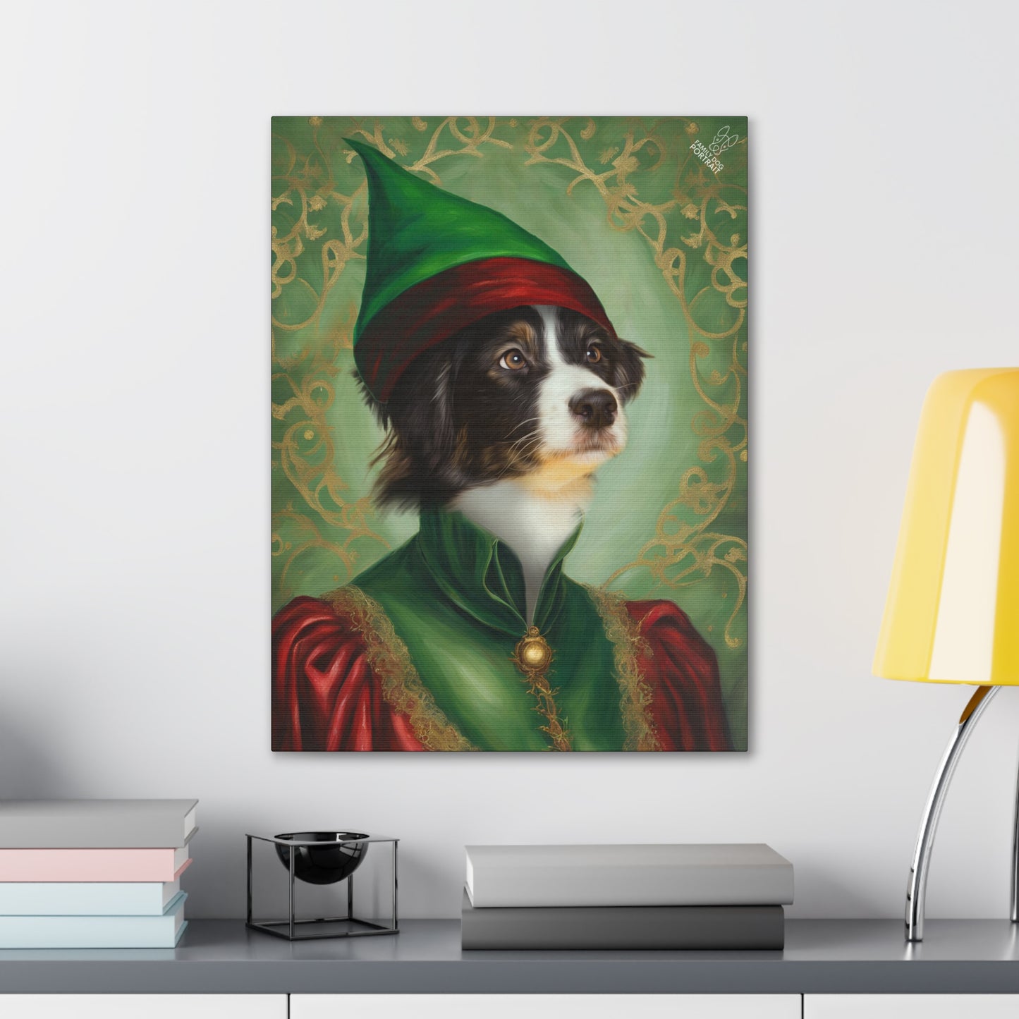 Canvas print of a dog dressed in elf-like costume on a wall above a desk.