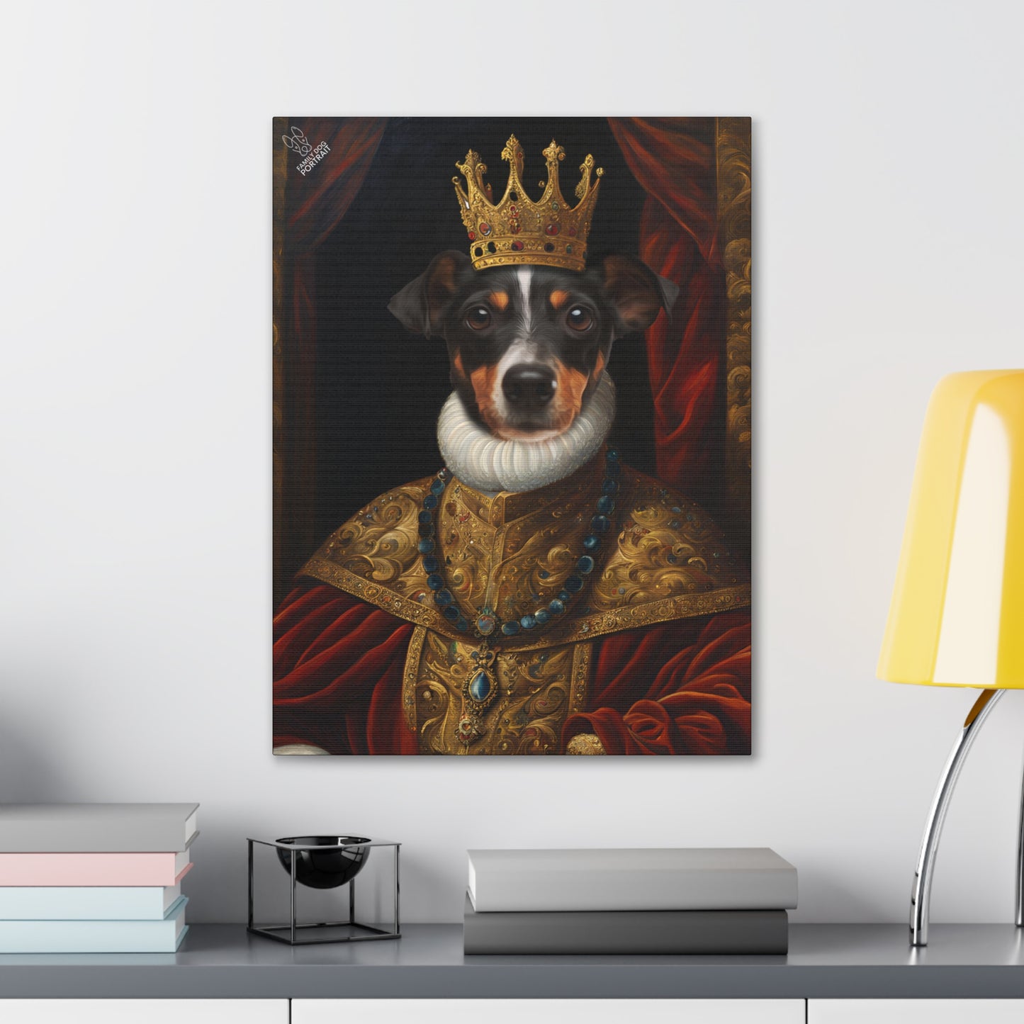 Framed portrait of a dog wearing a crown and robe on a shelf.