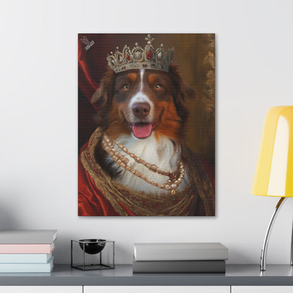 Canvas print of a dog wearing a crown and robe on a wall above a desk.