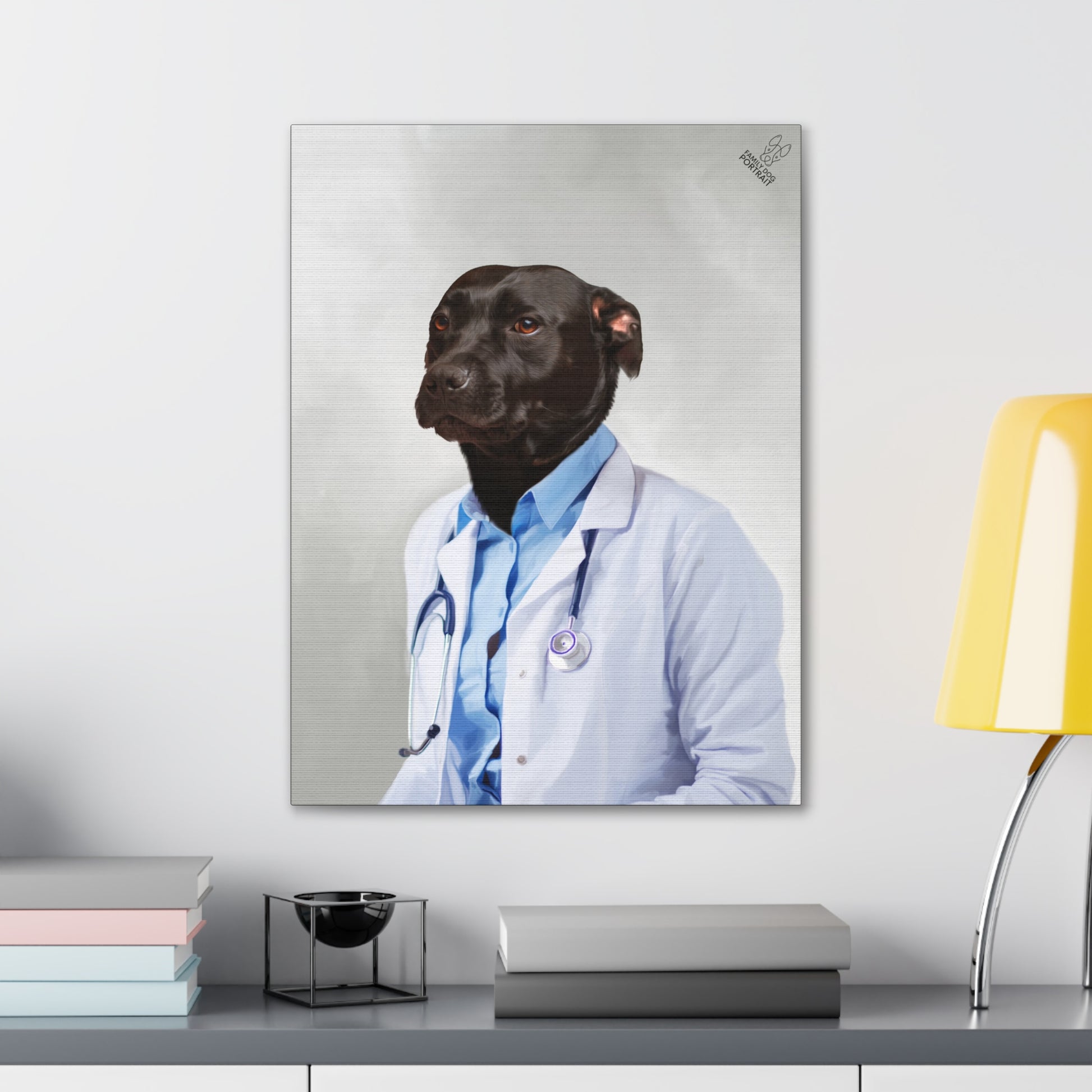 Framed artwork of a dog dressed as a doctor on a shelf with books and a lamp.