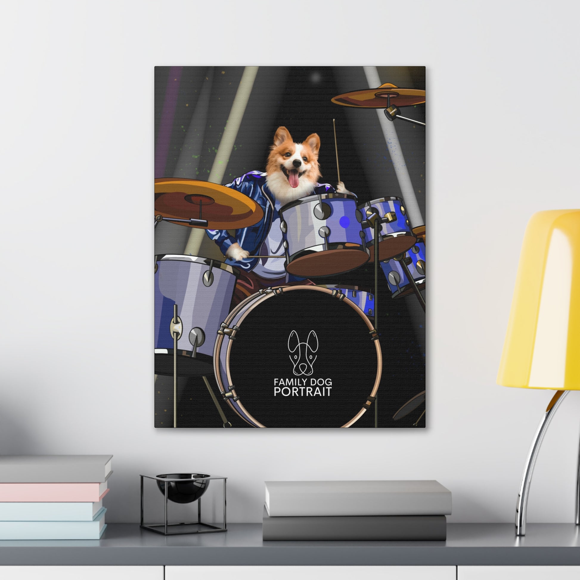 Canvas print of a dog playing drums on a wall above a desk.