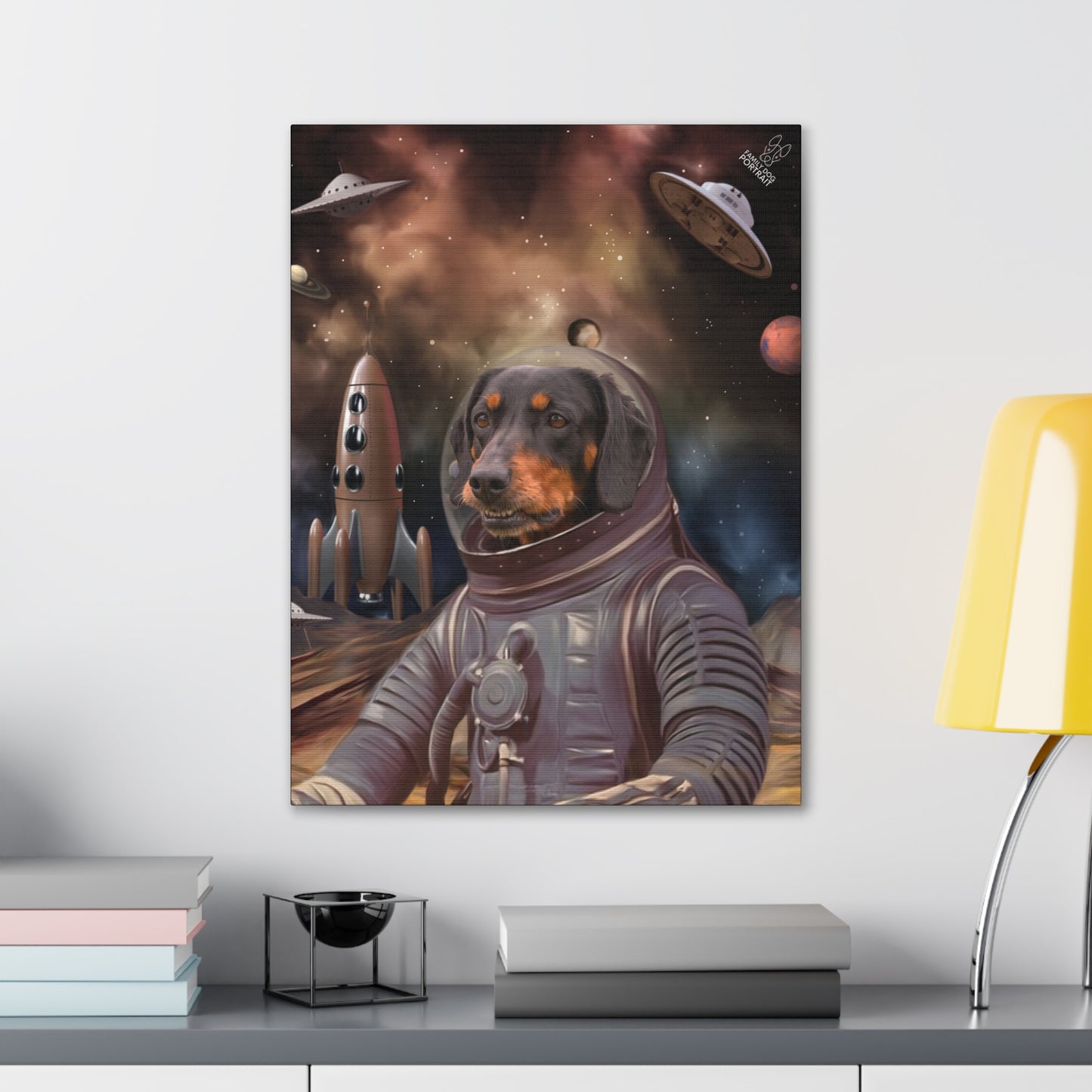 Canvas print of a dog in an astronaut suit with space-themed background on a wall.