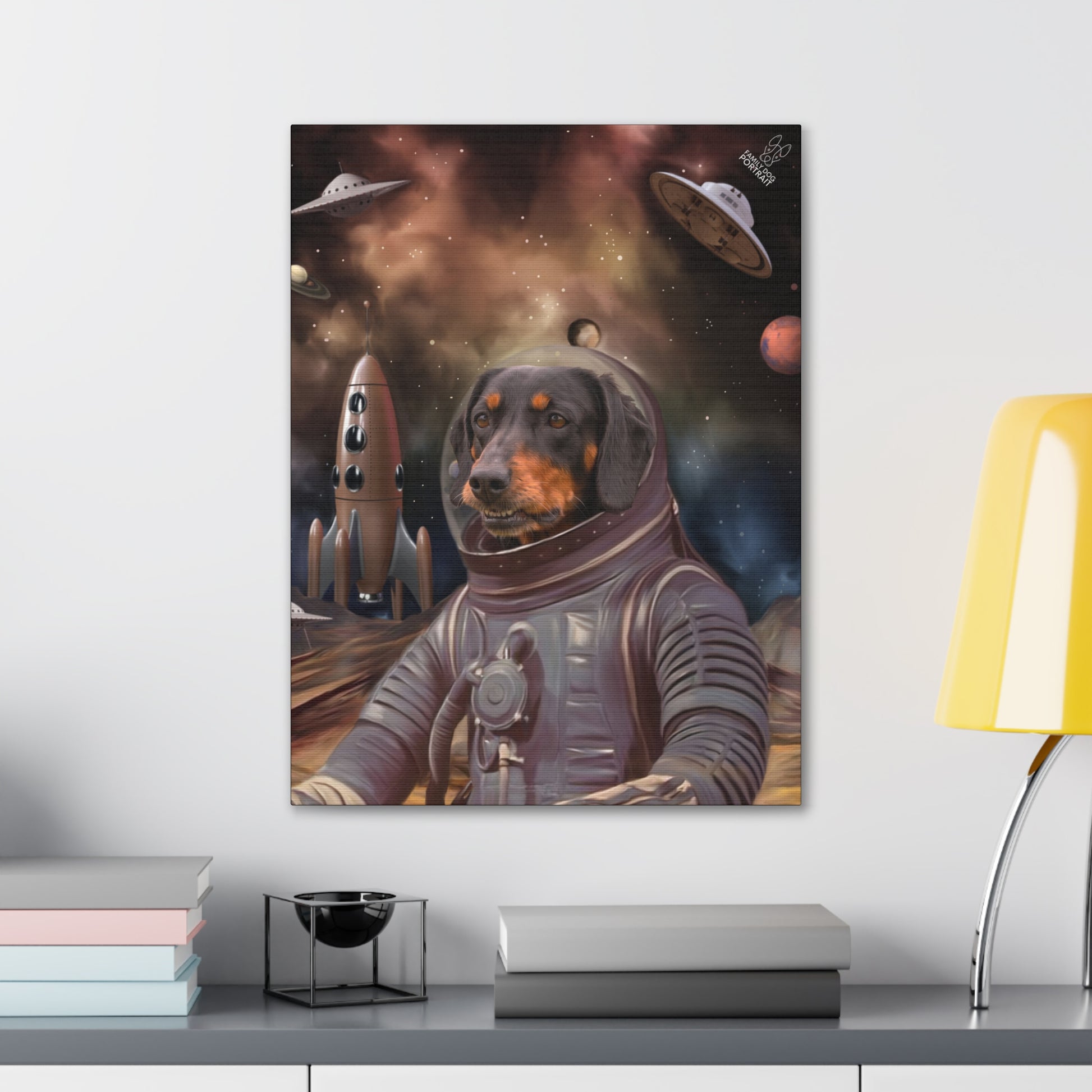 Canvas print of a dog in an astronaut suit with space-themed background on a wall.