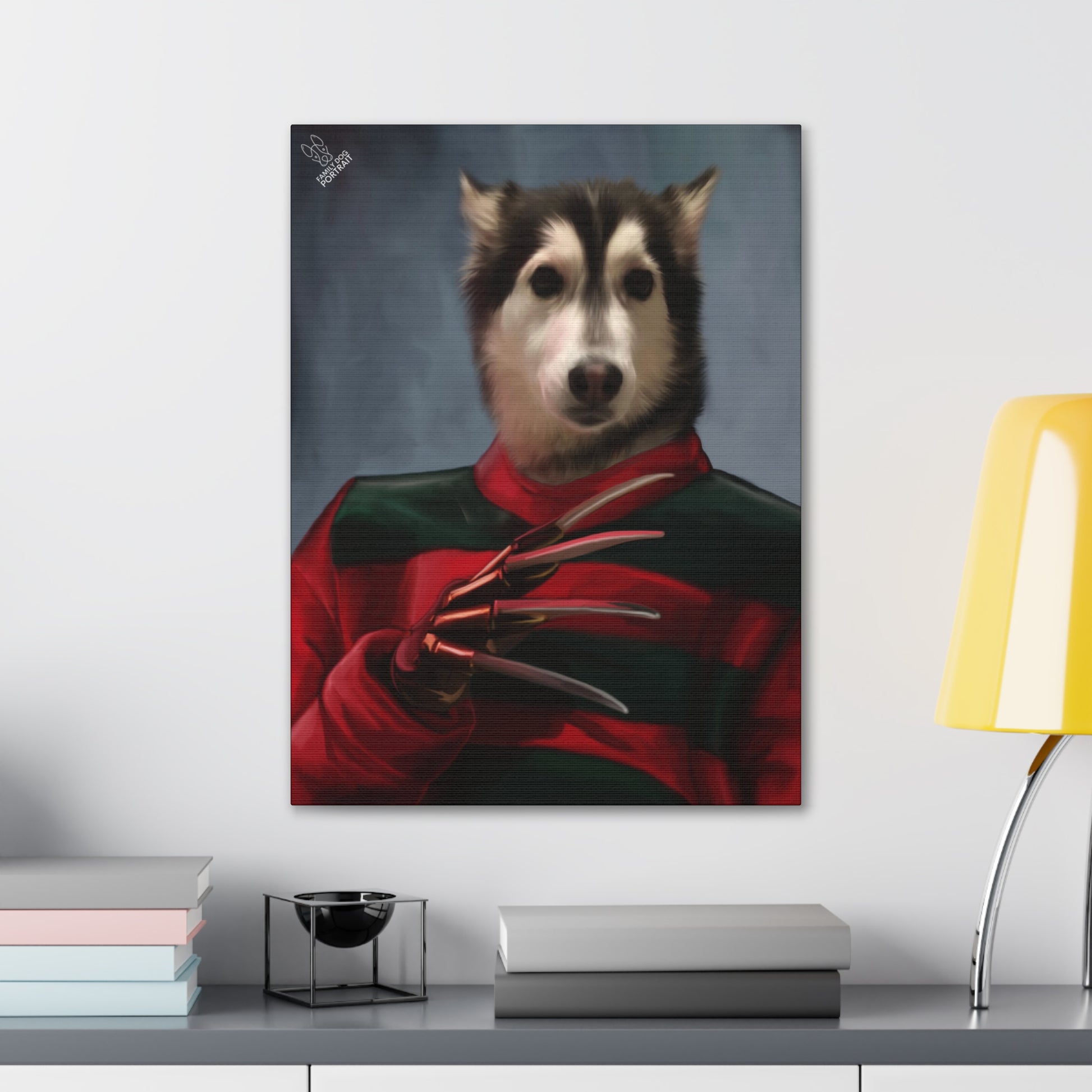 Framed artwork of a dog in a red and green outfit on a wall above a shelf.