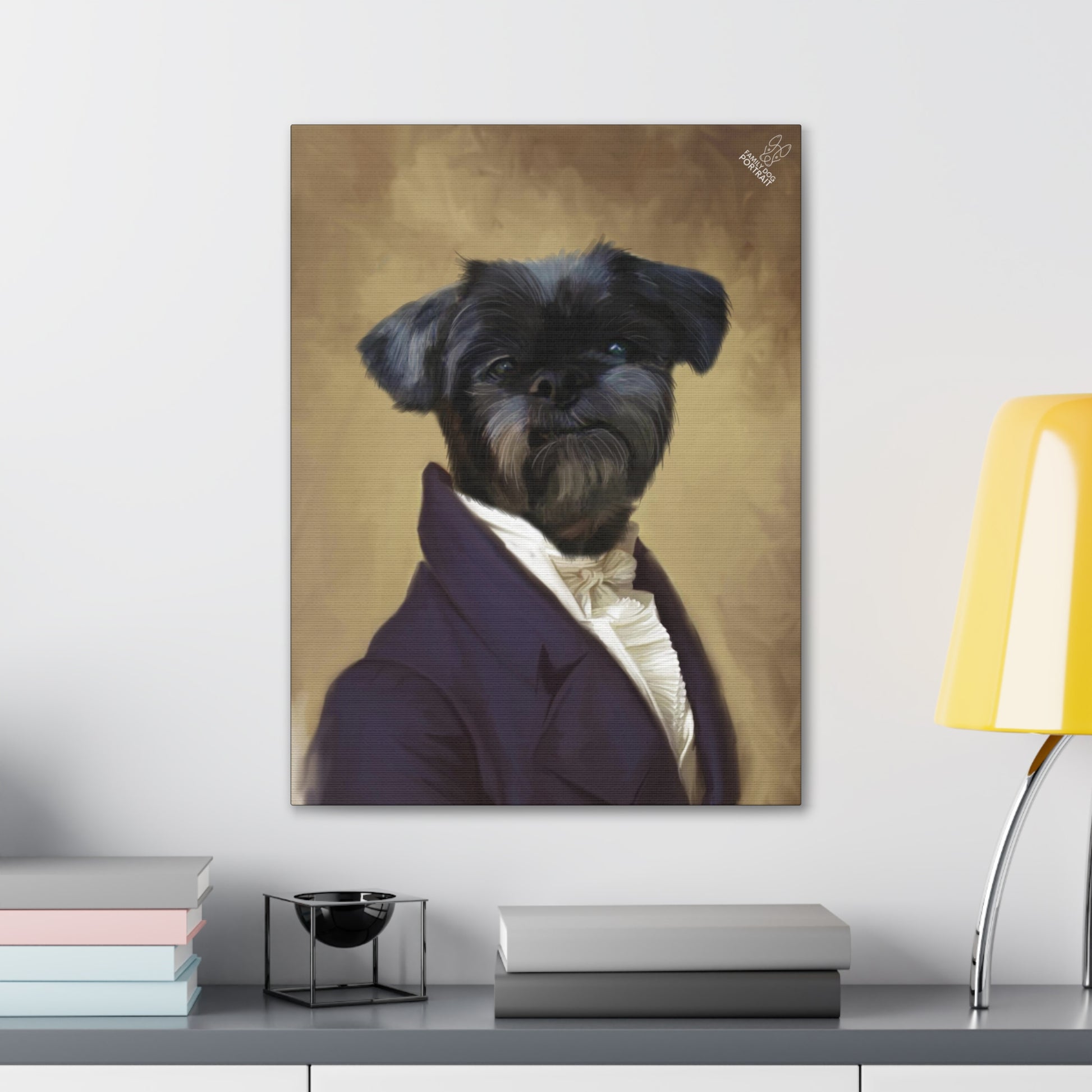 Canvas print of a dog in formal attire on a wall above a desk with books and a lamp.