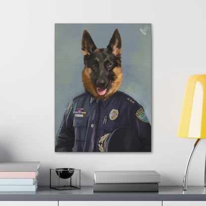Framed portrait of a dog in a police uniform on a wall above a desk.