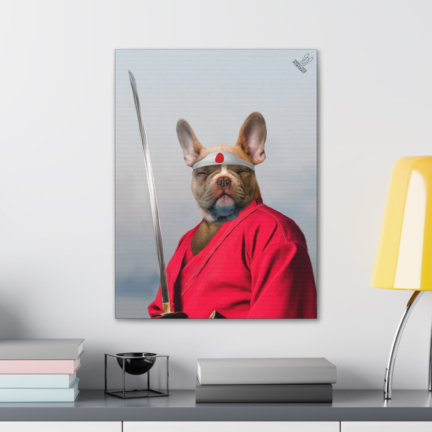 Framed artwork of a dog in samurai attire on a wall above a desk.